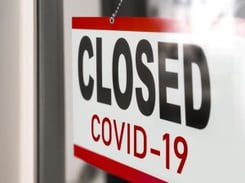Store sign saying CLOSED COVID-19