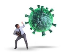 Man fighting a giant COVID-19 virus cell