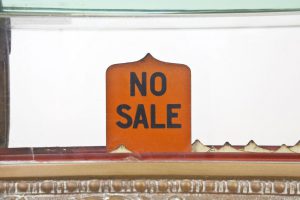 A photo of a "No Sale" sign